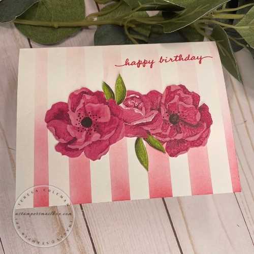 Add a sentiment and fussy cut flowers to complete this quick and simple card.